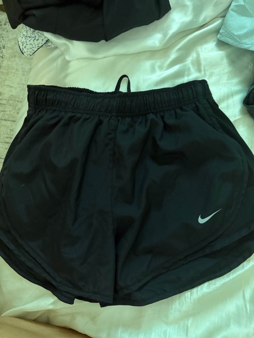 Nike Women’s Black Athletic Shorts with Silver Swoosh